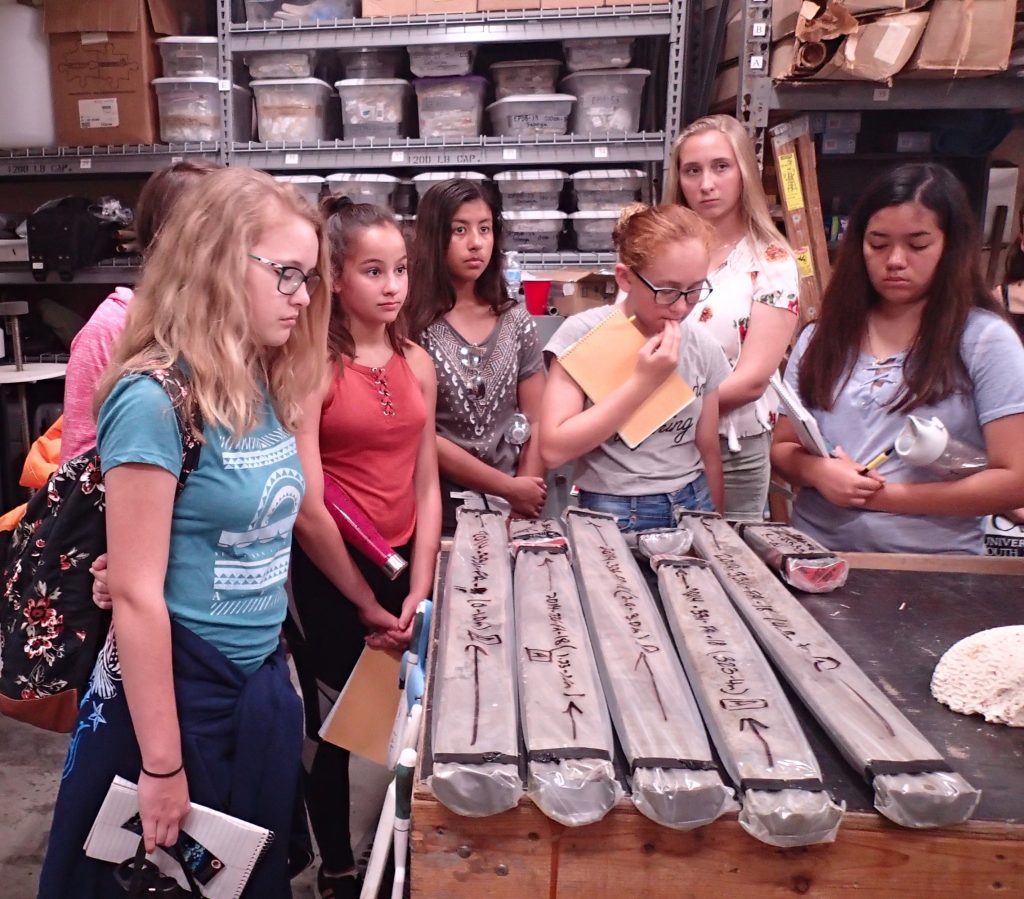 OCG campers receiving a demonstration from Jennifer Flannery of how sediment core samples are maintained at the USGS St. Petersburg Coastal and Marine Science Center. Photo credit: OCG Staff