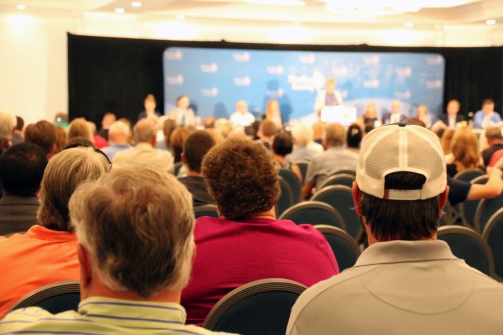 A near-to-capacity crowd listens on as Dr. Barbara Kirkpatrick (GCOOS) explains biological and human health related aspects of red tide. A near-to-capacity crowd listens on as Dr. Barbara Kirkpatrick (GCOOS) explains biological and human health related aspects of red tide.