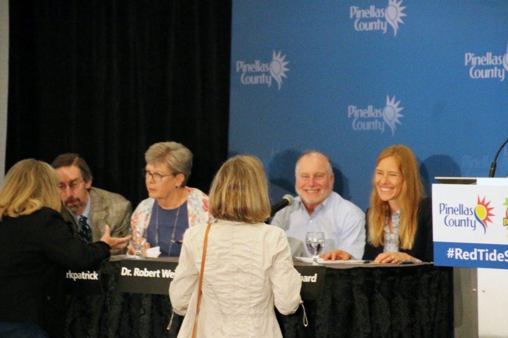 Panel scientists Dr. Richard Stumpf (NOAA), Dr. Barbara Kirkpatrick (GCOOS), Dr. Robert Weisberg (USFCMS), and Dr. Kate Hubbard (FWC FWRI) talk with audience members at the conclusion of the Red Tide Summit. Panel scientists Dr. Richard Stumpf (NOAA), Dr. Barbara Kirkpatrick (GCOOS), Dr. Robert Weisberg (USFCMS), and Dr. Kate Hubbard (FWC FWRI) talk with audience members at the conclusion of the Red Tide Summit.