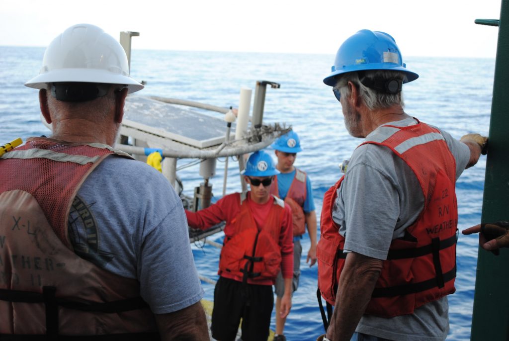 william-ely-and-talon-bullard-preparing-to-board-weatherbird-ii-after-trip-on-newly-deployed-buoy