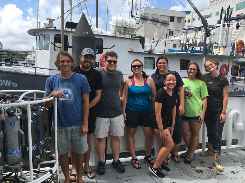 Back at port, the scientific party poses on the deck of the R/V Hogarth in front of its predecessor, the retired R/V Bellows. Left to right: Garrett Miller, Ian Williams, Sebastian DiGeronimo, Abby Blackburn, Brianna Michaud, Andrea Rodriguez Campos, Nicole Seiden, and Grace Koziol. Back at port, the scientific party poses on the deck of the R/V Hogarth in front of its predecessor, the retired R/V Bellows. Left to right: Garrett Miller, Ian Williams, Sebastian DiGeronimo, Abby Blackburn, Brianna Michaud, Andrea Rodriguez Campos, Nicole Seiden, and Grace Koziol.