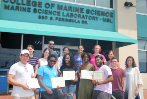 REU participants were awarded their certificates of completion in a commencement ceremony with CMS graduate students and faculty. REU participants were awarded their certificates of completion in a commencement ceremony with CMS graduate students and faculty.