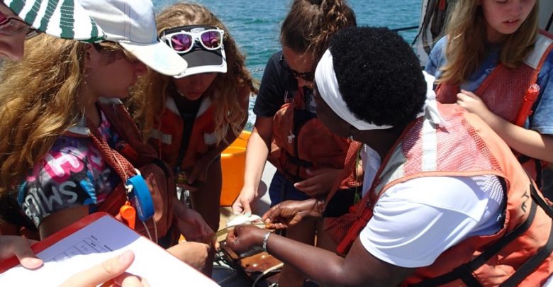 Teens Learning at Sea with the Oceanography Camp for Girls during a research cruise with E & O staff aboard RV Angari