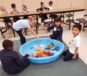1st graders fishing for their eggs. 1st graders fishing for their eggs.