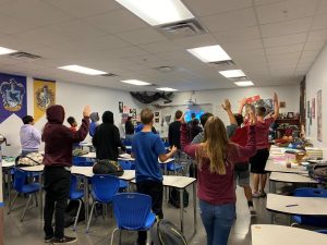 Students in the biology class playing the fish trivia game. Students in the biology class playing the fish trivia game.